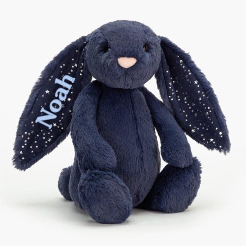 Kani pehmolelu nimellä brodeerattuna tummansinisessä Jellycat-mallissa