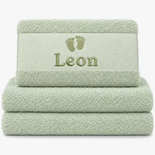 pastel mint colored towel with name embroidered